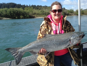 The lower Rogue River produced Culver, OR resident Kari Nelson’s first-ever salmon on Tuesday. The springer was caught on an anchovy. Photo courtesy of Steve Huber’s Guide Service